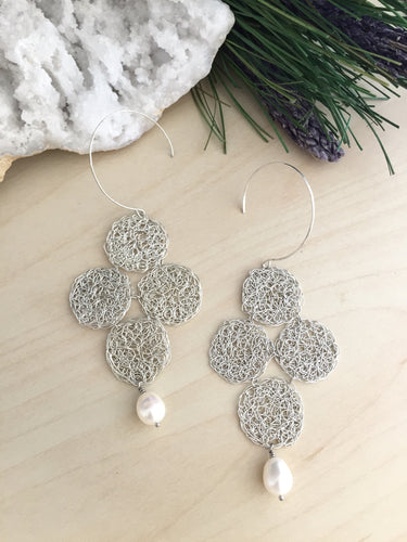 Sterling silver wire crochet quaterfoil design earrings with a white freshwater pearl drop 