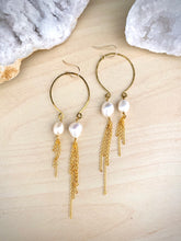 Load image into Gallery viewer, Inverted gold hoop earrings with white freshwater pearl drops and long gold chain tassels hung from 14k gold fill ear wires